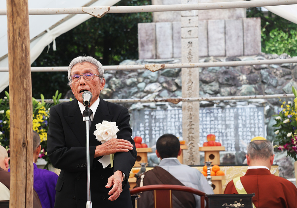 戦争の悲惨さを話す田中理事長