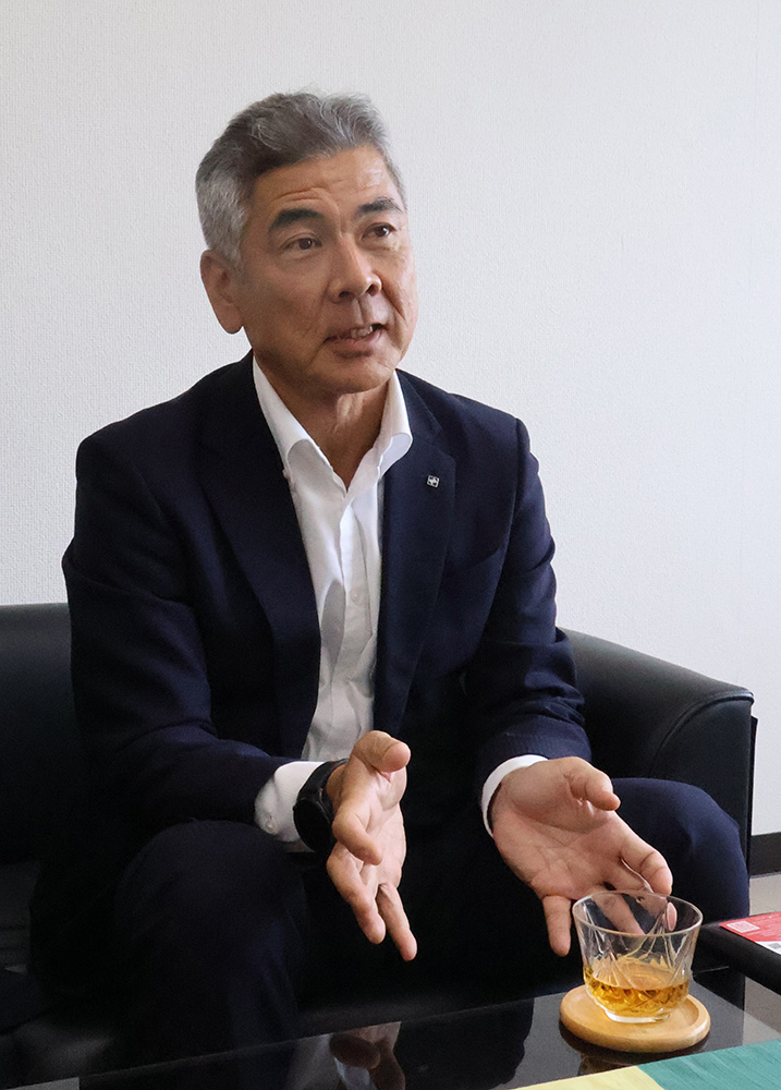 取り組みを紹介する水野代表理事