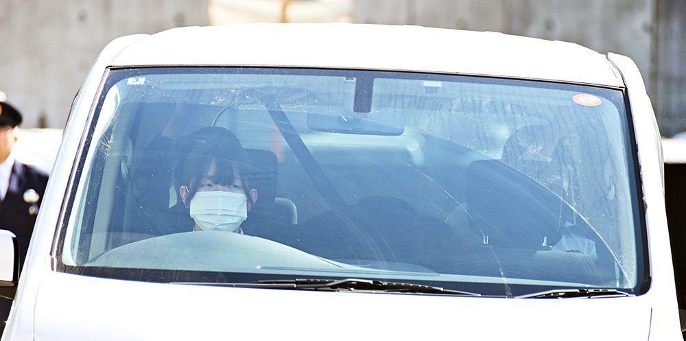 送検される福田容疑者(21日午後0時33分)